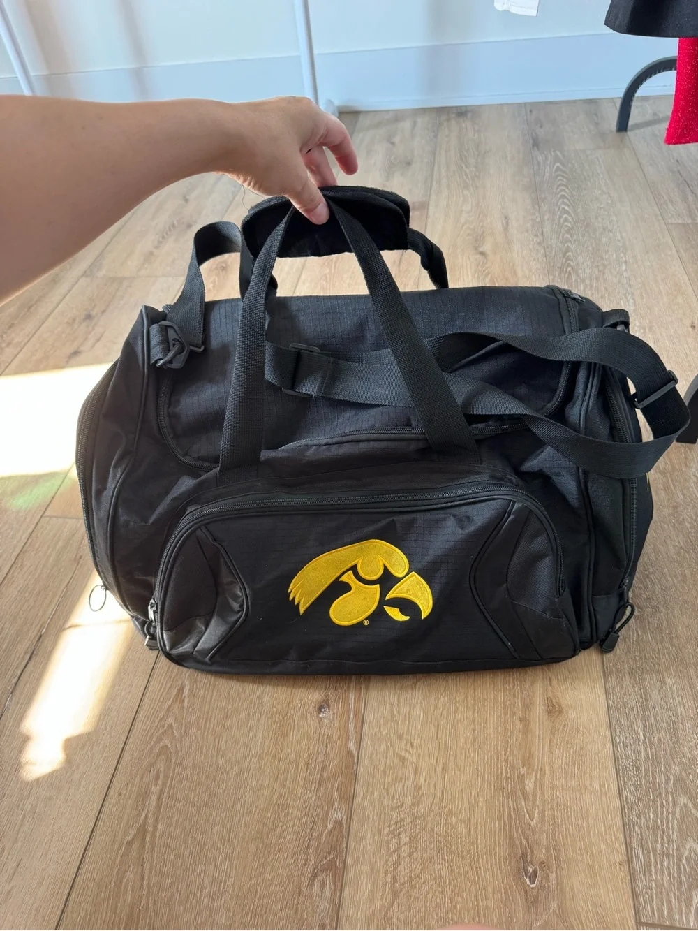 Black Iowa Hawkeyes duffel bag